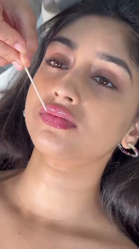 Finishing touches after a lip filler treatment at House of Riri